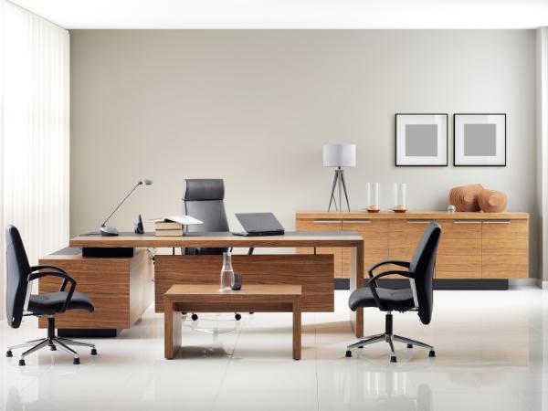 Modern executive office setup with wooden furniture from Get Furniture as the best furniture stores in Delhi