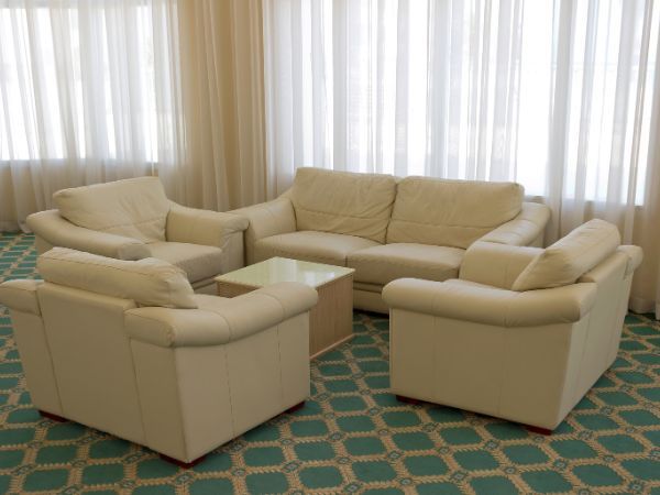 Elegant white restaurant dining sofas by Get Furniture, a trusted Restaurant Dining Sofas Supplier in India