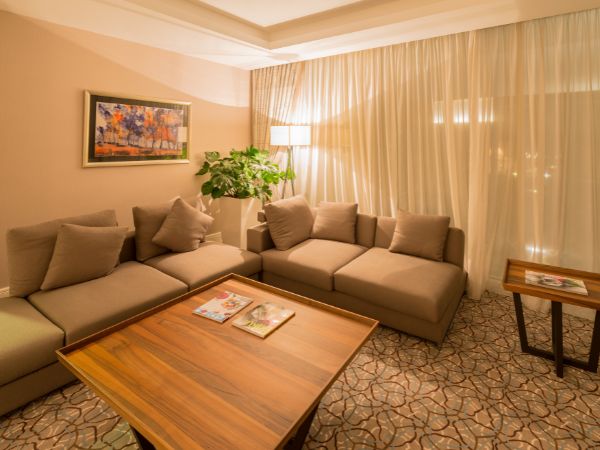 Cozy brown-toned living room highlighting which furniture option is best for your home from Get Furniture.