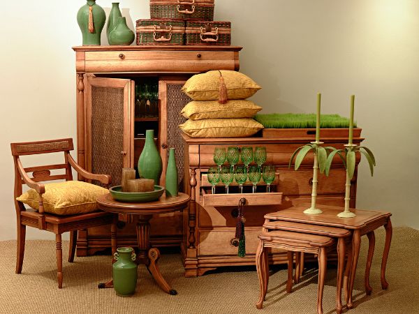Elegant wooden and cane furniture set with chairs, tables, cabinets, and decorative accents by Get Furniture as a leading cane furniture manufacturer in Delhi.