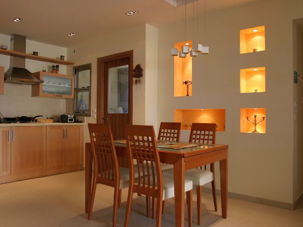 Contemporary dining and kitchen setup by kitchen furniture manufacturer Delhi with Get Furniture Excellence.